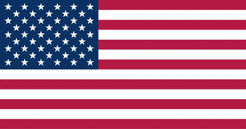 A flag of red and white horizontal stripes with rows of white stars on a blue corner